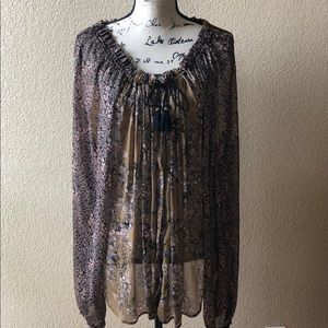 Free People sheer floral blouse.